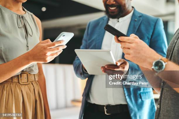 diversity in working team using internet on phones and digital tablet for teamwork growth in the office. professional staff work with 5g technology to match work schedule online the company website - touchpad bildbanksfoton och bilder