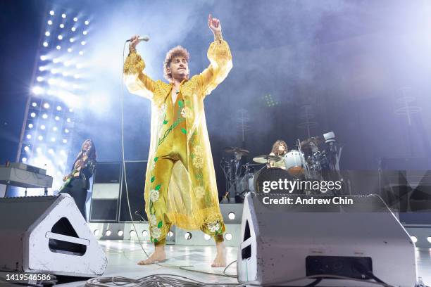 Sam Kiszka, Josh Kiszka and Danny Wagner of Greta Van Fleet perform on stage during their 'Dreams In Gold Tour' at Rogers Arena on August 30, 2022 in...