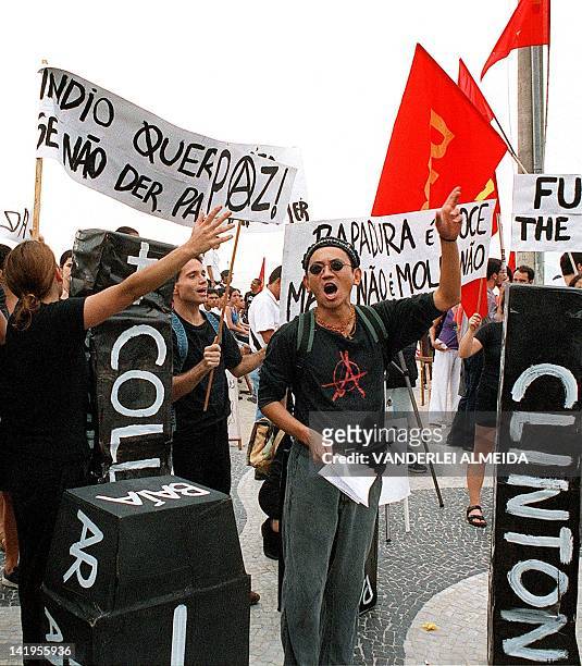 Students and other demonstrators protest in Rio de Janeiro 19 April 2000 against the 500 year anniversary of the discovery of Brazil. Estudiantes y...