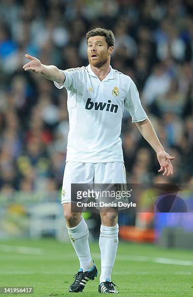 Xabi Alonso of Real Madrid CF gestures during the La Liga match between Real Madrid CF and Real Sociedad de Futbol at Estadio Santiago Bernabeu on...