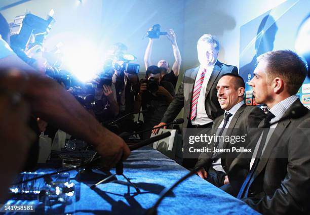 Franck Ribery and Philipp Lahm attend a Bayern Muenchen press conference ahead of their UEFA Champions League Round of 8 first leg match against...