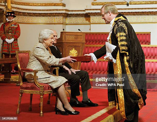 Queen Elizabeth II accompanied by Prince Philip, Duke of Edinburgh receives a copy of the loyal address from the Lord Mayor of London Alderman David...