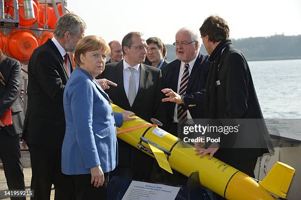 German Chancellor Angela Merkel, Schleswig-Holstein Governor Peter Harry Carstensen, Economy Minister Jost de Jager, Head of GEOMAR Peter Herzig and...
