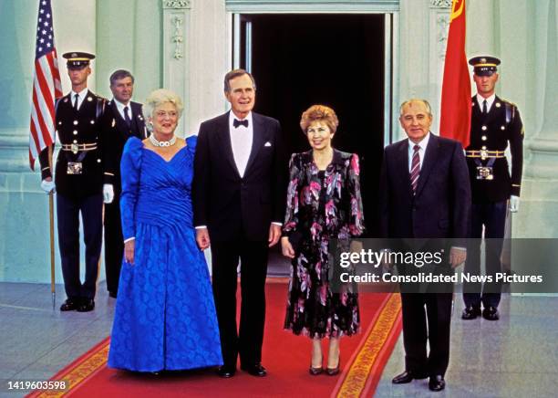 Portrait of, from left, US First Lady Barbara Bush , US President George HW Bush , Raisa Gorbachev , and Soviet President Mikhail Gorbachev as they...