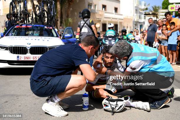 Julian Alaphilippe of France and Team Quick-Step - Alpha Vinyl reacts to a fall and is assisted by the medical team during the 77th Tour of Spain...