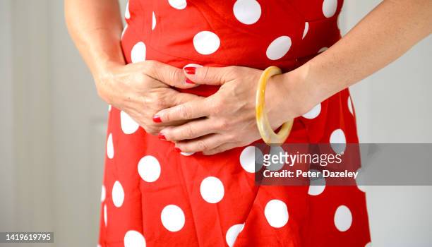 woman in pain with stomach ache - woman hemorrhoids stock pictures, royalty-free photos & images