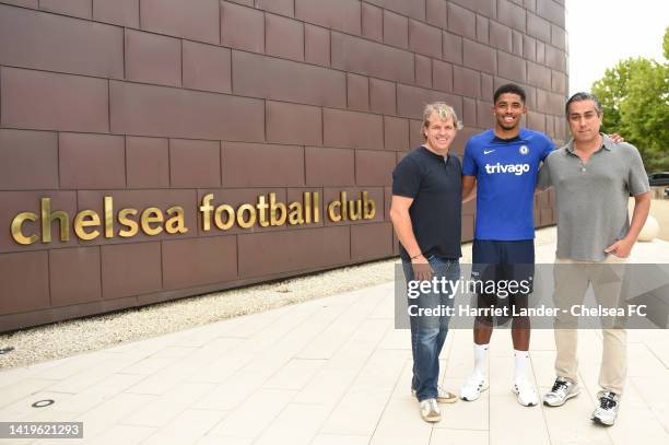 New Chelsea signing Wesley Fofana poses for a photograph with Todd Boehly, Chairman of Chelsea, and Behdad Eghbali, Co-Controlling Owner of Chelsea...