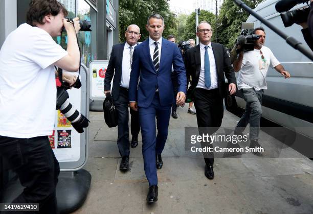 Ryan Giggs leaves Manchester Crown Court with his legal team on August 31, 2022 in Manchester, England. The Jury in the trial of the former...