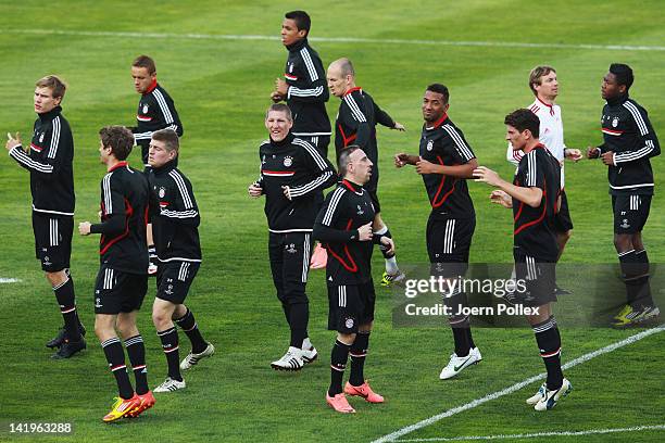 Player of Muenchen in action during a Bayern Muenchen training session ahead of their UEFA Champions League Round of 8 first leg match against...