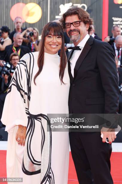 Cristina Fogazzi aka Estetista Cinica and Massimo Portulano attend the "White Noise" and opening ceremony red carpet at the 79th Venice International...