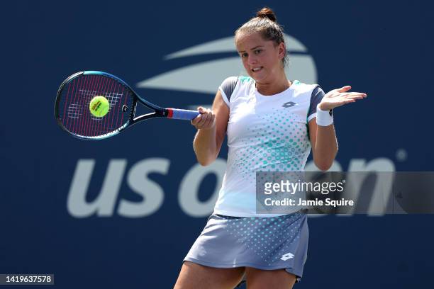 Viktoria Kuzmova of Slovakia plays a forehand against Shelby Rogers of the United States in their Women's Singles Second Round match on Day Three of...