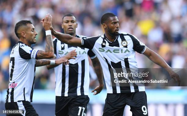 Beto of Udinese celebrates with team mates after scoring their team's first goal during the Serie A match between Udinese Calcio and ACF Fiorentina...