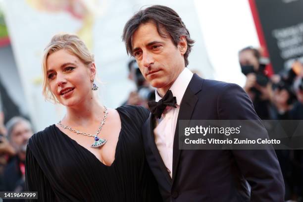 Greta Gerwig and director Noah Baumbach attend the "White Noise" and opening ceremony red carpet at the 79th Venice International Film Festival on...