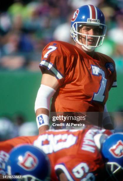 Quarterback John Elway of the Denver Broncos calls a play in the game between the Denver Broncos vs the New York Jets at The Meadowlands on September...