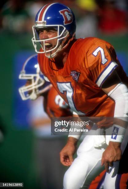 Quarterback John Elway of the Denver Broncos calls a play in the game between the Denver Broncos vs the New York Jets at The Meadowlands on September...