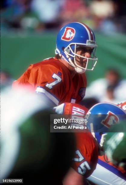 Quarterback John Elway of the Denver Broncos calls a play in the game between the Denver Broncos vs the New York Jets at The Meadowlands on September...