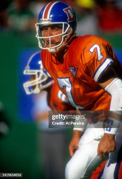 Quarterback John Elway of the Denver Broncos calls a play in the game between the Denver Broncos vs the New York Jets at The Meadowlands on September...