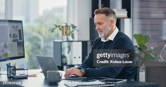 Ceo At Computer Mature Ceo Typing And Working On Laptop In His Office Corporate ...
