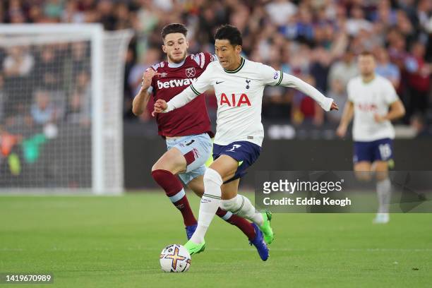 Declan Rice of West Ham United marks Son Heung-Min of Tottenham Hotspur during the Premier League match between West Ham United and Tottenham Hotspur...