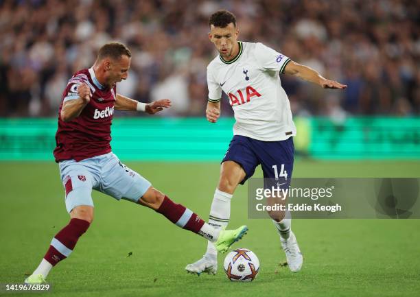 Vladimir Coufal of West Ham United challenges Ivan Perisic of Tottenham Hotspur during the Premier League match between West Ham United and Tottenham...