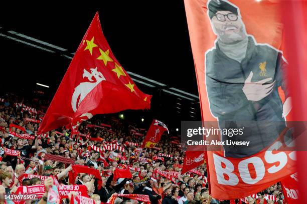 General view as fans of Liverpool wave flags, banners and hold up scarfs prior to kick off of the Premier League match between Liverpool FC and...