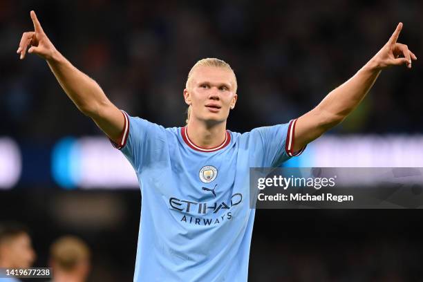 Erling Haaland of Manchester City celebrates after scoring their team's third goal and their hat trick during the Premier League match between...