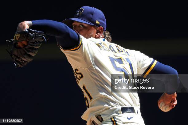 Freddy Peralta of the Milwaukee Brewers throws a pitch during the third inning against the Pittsburgh Pirates at American Family Field on August 31,...