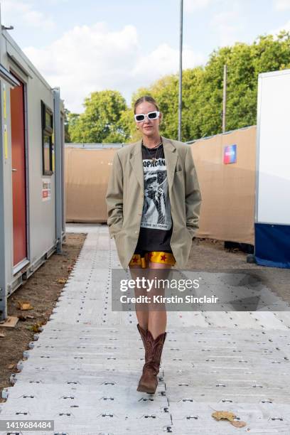 Sofia Hedblom wears boxing shorts, vintage Giorgio Armani jacket, Acne Studios T shirt, Christopher Kane sunglasses and vintage Tony Montana cowboy...