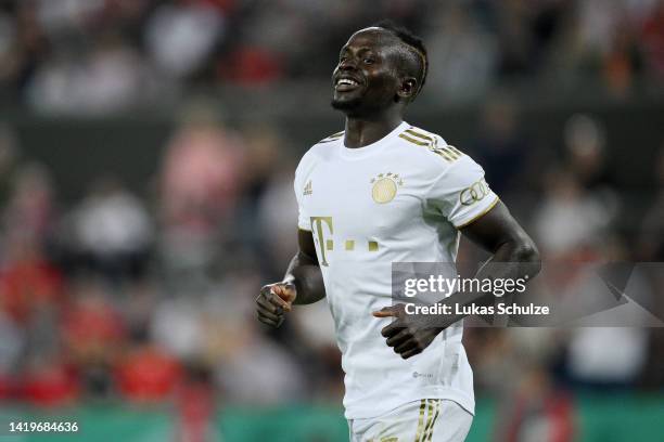 Sadio Mane of Bayern Munich celebrates after scoring their team's third goal during the DFB Cup first round match between FC Viktoria Köln and FC...