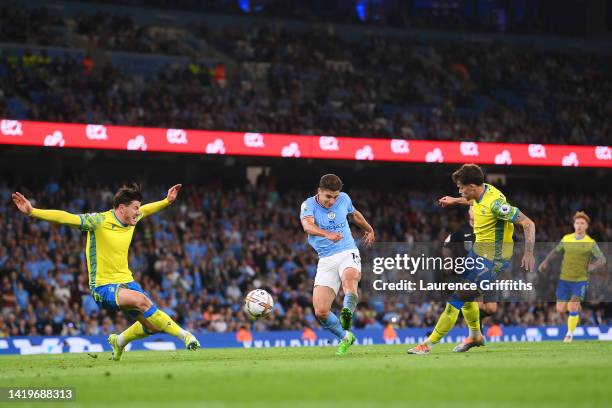 Julian Alvarez of Manchester City scores their team's sixth goal during the Premier League match between Manchester City and Nottingham Forest at...