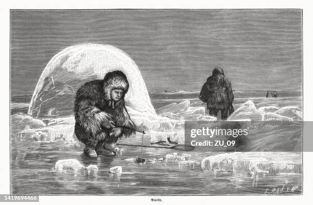 eskimo woman in alaska at ice fishing, woodcut, published 1885 - ice fishing stock illustrations