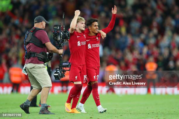 Harvey Elliott celebrates with Fabio Carvalho of Liverpool after the final whistle of the Premier League match between Liverpool FC and Newcastle...