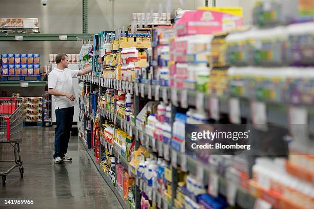 Customer shops inside a BJ's Wholesale Club Inc. Store in Falls Church, Virginia, U.S., on Tuesday, March 27, 2012. The U.S. Bureau of Economic...