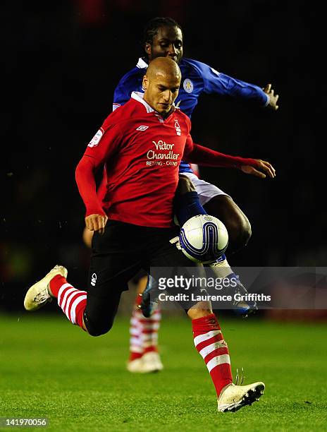 Adlene Guedioura of Nottingham Forest battles with Sol Bamba of Leicester City during the npower championship match between Leicester City and...