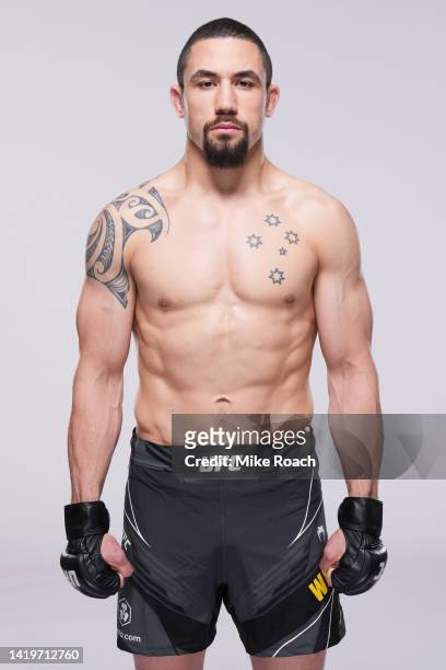 Robert Whittaker poses for a portrait during a UFC photo session on August 31, 2022 in Paris, France.