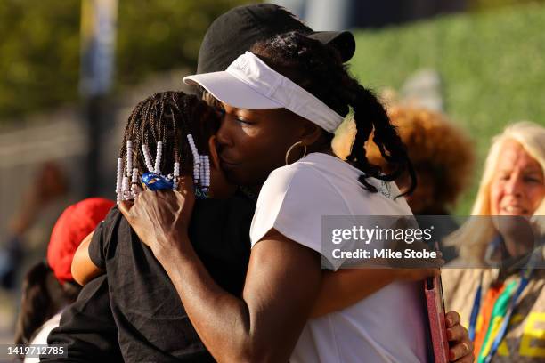 Venus Williams greets Alexis Olympia Ohanian Jr. And Alexis Ohanian during arrivals on Day Three of the 2022 US Open at USTA Billie Jean King...