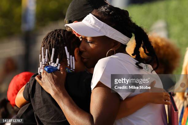 Venus Williams greets Alexis Olympia Ohanian Jr. And Alexis Ohanian during arrivals on Day Three of the 2022 US Open at USTA Billie Jean King...