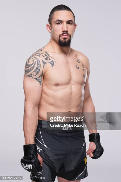 Robert Whittaker poses for a portrait during a UFC photo session on August 31, 2022 in Paris, France.