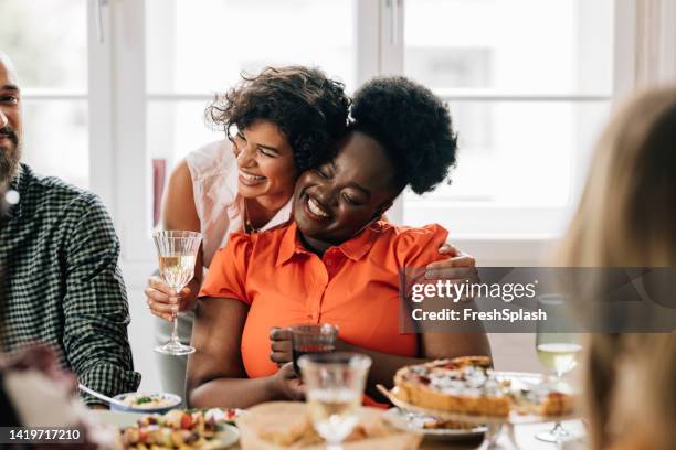 a group of happy diverse friends enjoying lunch party - champagne brunch stock pictures, royalty-free photos & images