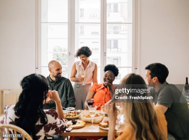 a group of happy diverse friends enjoying lunch party - the brunch stock pictures, royalty-free photos & images