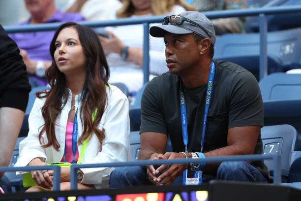 Erica Herman and Tiger Woods look on prior to the match between Anett Kontaveit of Estonia and Serena Williams of the United States in their Women's...