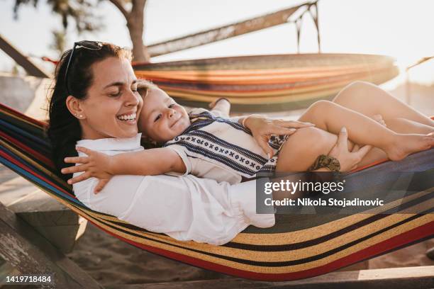 relaxing moments in a hammock - hammock asia stock pictures, royalty-free photos & images