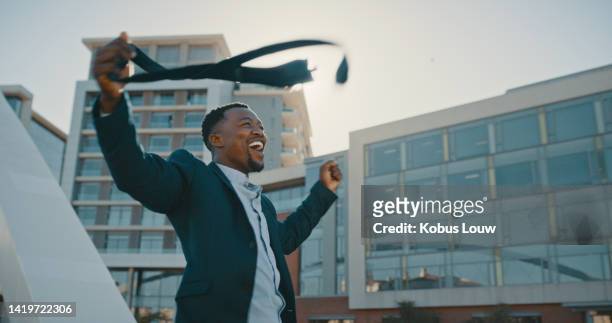 winner, businessman and successful sales manager celebrating corporate success with a big smile outside office. winning, happy and worker in leadership position celebrates a management job promotion - big dreams stockfoto's en -beelden