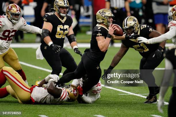 Javon Kinlaw of the San Francisco 49ers sacks Taysom Hill of the New Orleans Saints during an NFL game at Mercedes-Benz Superdome on November 15,...