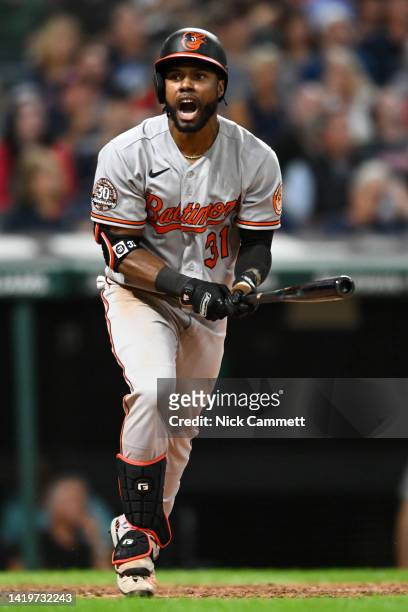 Cedric Mullins of the Baltimore Orioles reacts to flying out during the eighth inning against the Cleveland Guardians at Progressive Field on August...