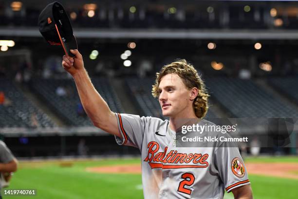 Gunnar Henderson of the Baltimore Orioles tips his hat to the crowd after the team's 4-0 win over the Cleveland Guardians in his Major League debut...