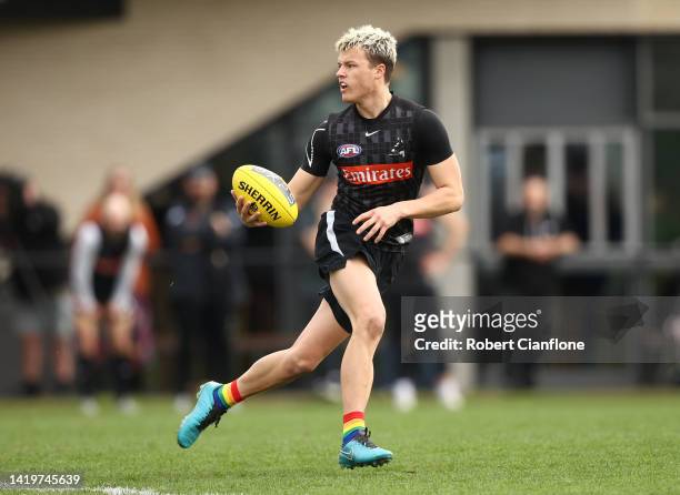 Jack Ginnivan of the Magpies controls the ball during a Collingwood Magpies AFL training session at Olympic Park Oval on September 01, 2022 in...