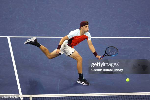 Jack Draper of Great Britain returns a shot against Felix Auger Aliassime of Canada in their Men's Singles Second Round match on Day Three of the...