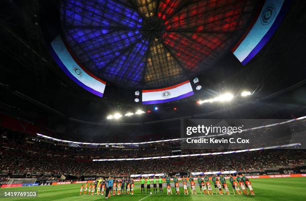 The starting lineups for Paraguay and Mexico stand prior to an international friendly between Mexico and Paraguay at Mercedes-Benz Stadium on August...