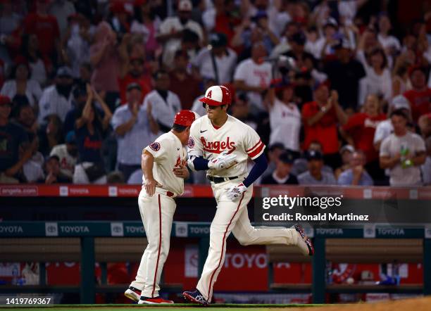 Shohei Ohtani of the Los Angeles Angels runs after hitting a three-run home run against the New York Yankees in the sixth inning at Angel Stadium of...